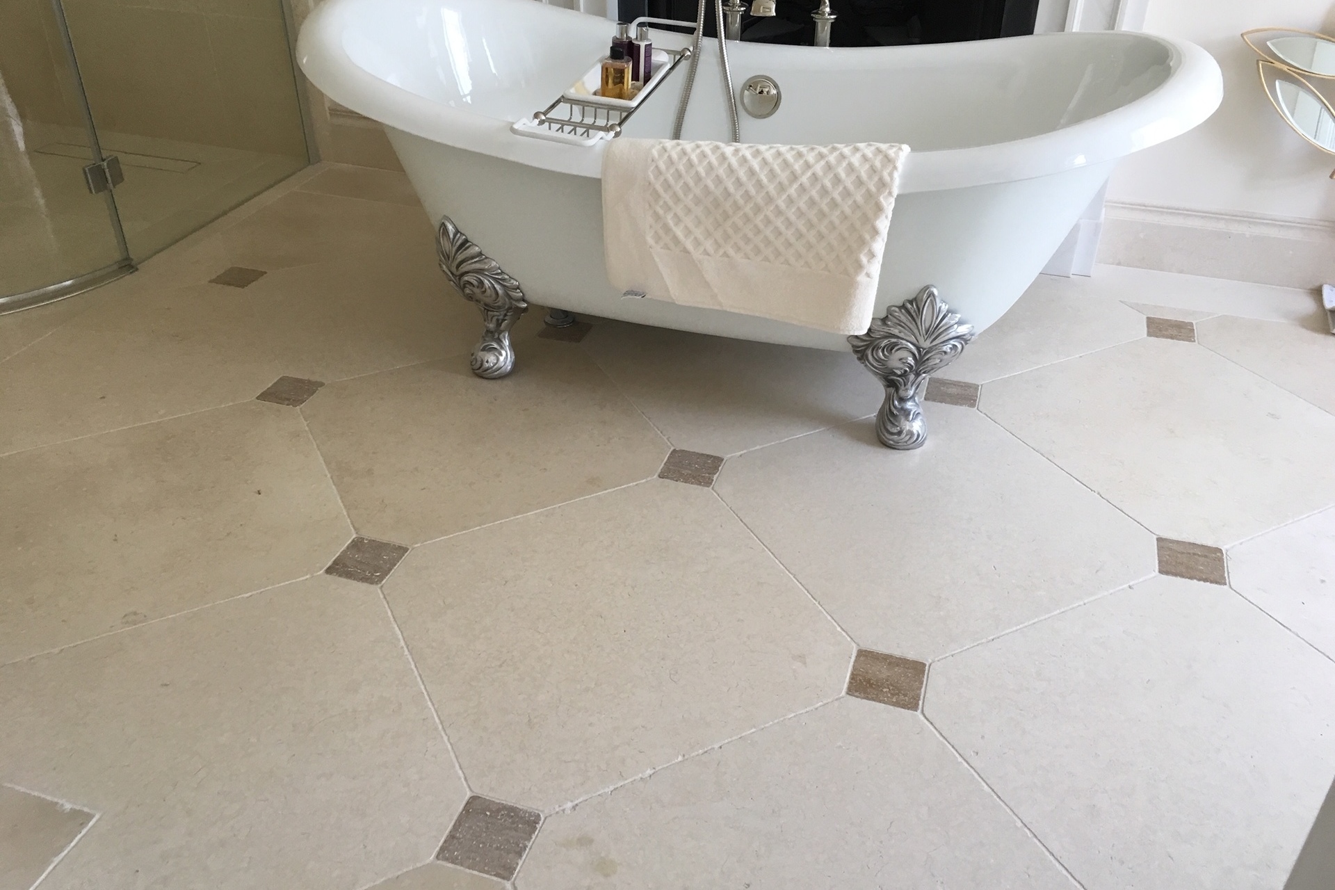 Cathedral Tumbled Limestone cut to Octagons with Brown Tumbled Travertine Cabochons
